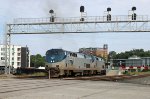 AMTK 167 & 84 lead the Silver Star away from the station